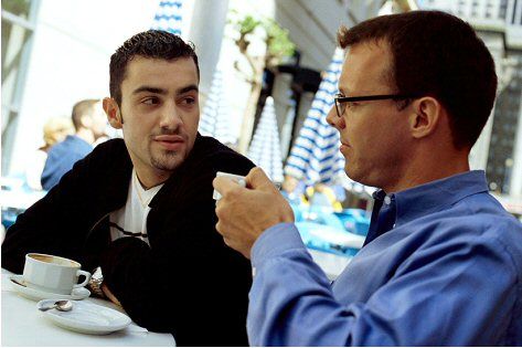 two-guys-talking-in-coffeeshop