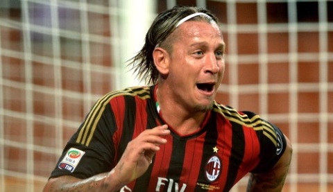 MILAN, ITALY - SEPTEMBER 01:  Philippe Mexes of AC Milan celebrates scoring his team's second goal during the Serie A match between AC Milan and Cagliari Calcio at San Siro Stadium on September 1, 2013 in Milan, Italy.  (Photo by Claudio Villa/Getty Images)
