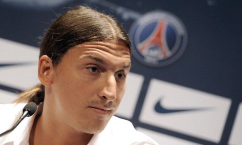 Paris Saint-Germain (PSG) football club's newly recruited Sweden striker Zlatan Ibrahimovic listens during a press conference as part of his official presentation at the Parc des Princes on July 18, 2012 in Paris.  AFP PHOTO / BERTRAND GUAY        (Photo credit should read BERTRAND GUAY/AFP/GettyImages)